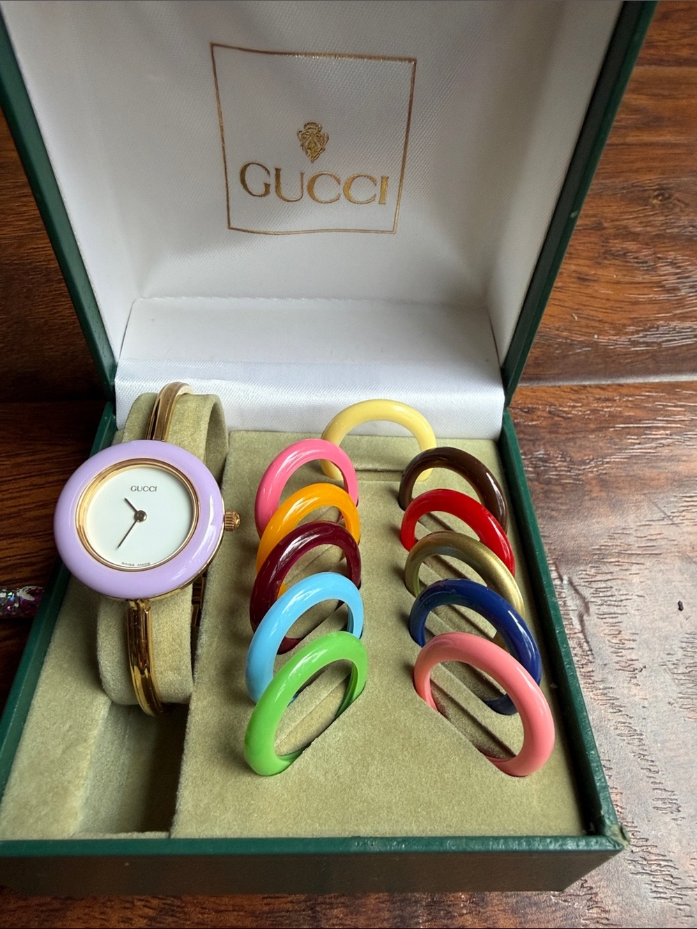 Gucci Womenโs Interchangeable Bezel Watch - Lavender with Multi-Color Bezels